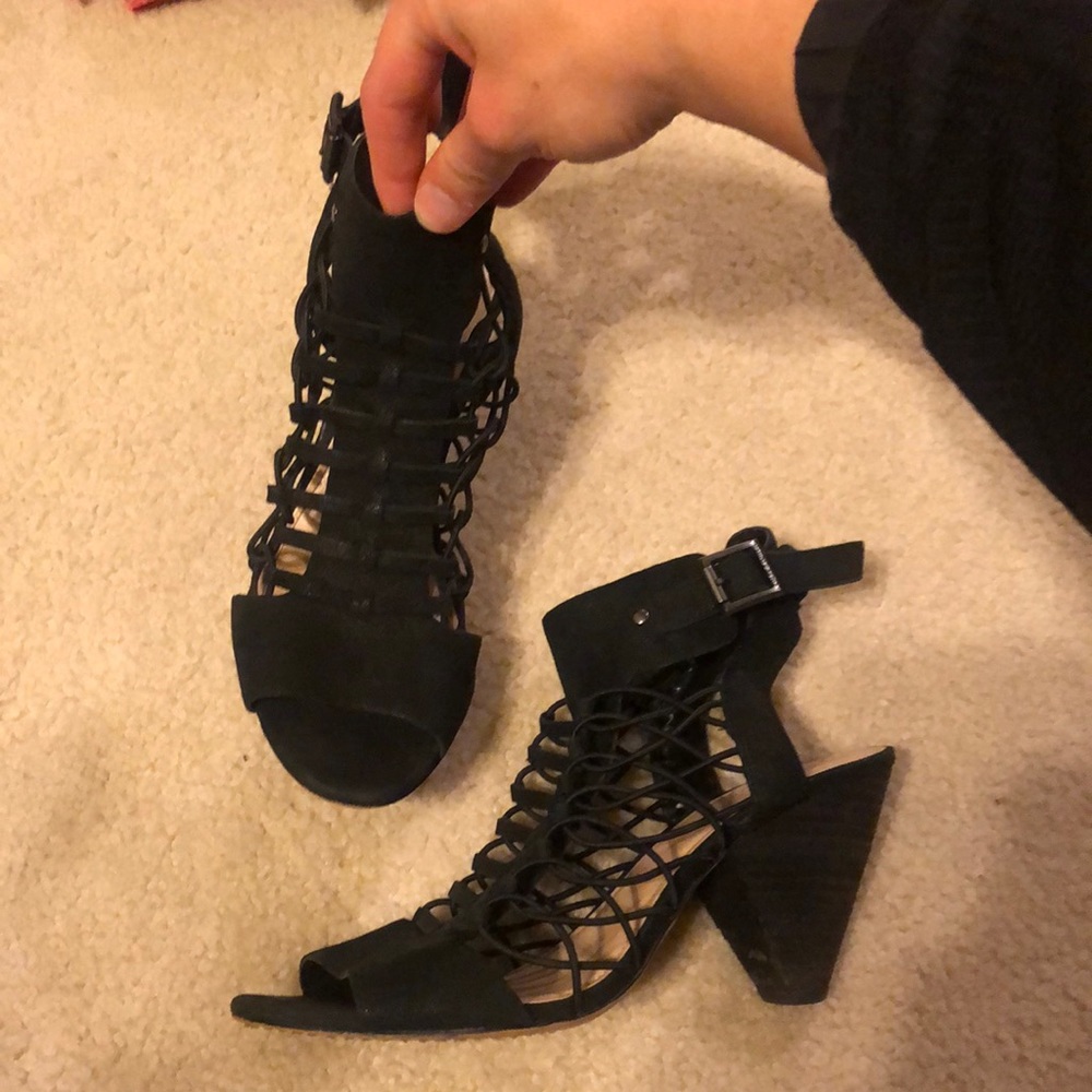 Vince Camuto black elastic cage block heel with buckle.
